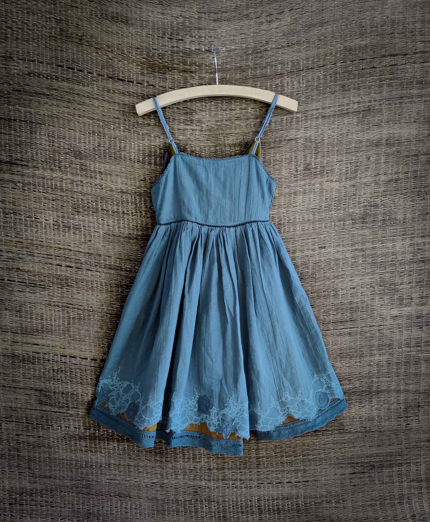Back view of reversible dress with delicate lace details